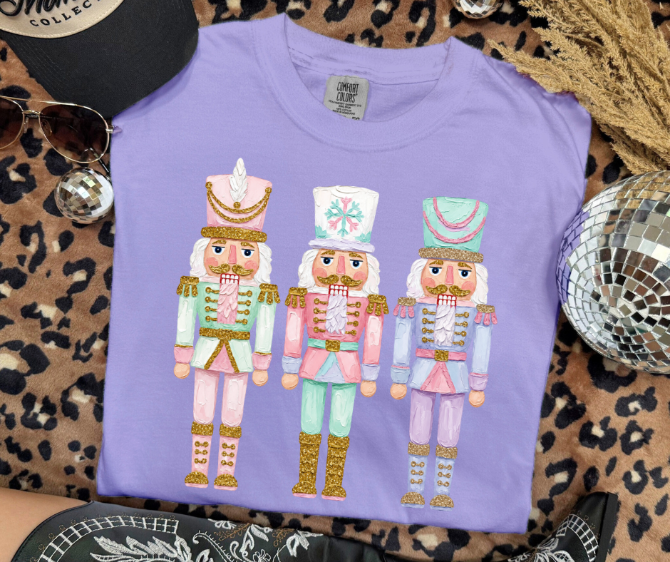 Pastel Nutcrackers Christmas graphic tee in Violet