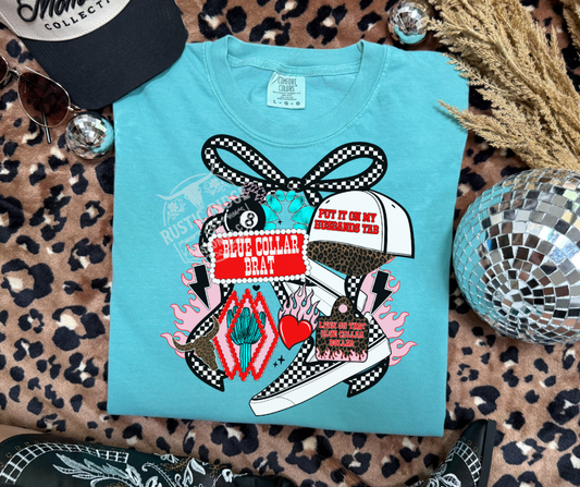 Blue collar brat graphic on comfort colors turquoise tee styled flat lay