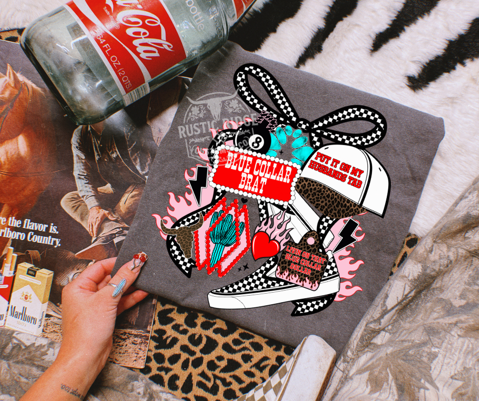 Blue collar brat graphic on comfort colors pepper tee styled flat lay