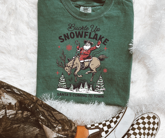 Buckle Up Snowflake western Santa graphic tee in Blue Spruce