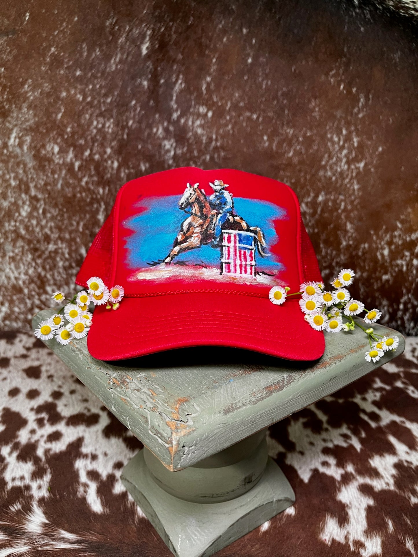 Hand-painted patriotic trucker hats featuring western Americana artwork and one-of-a-kind designs by Rustic Ridge Customs & Co