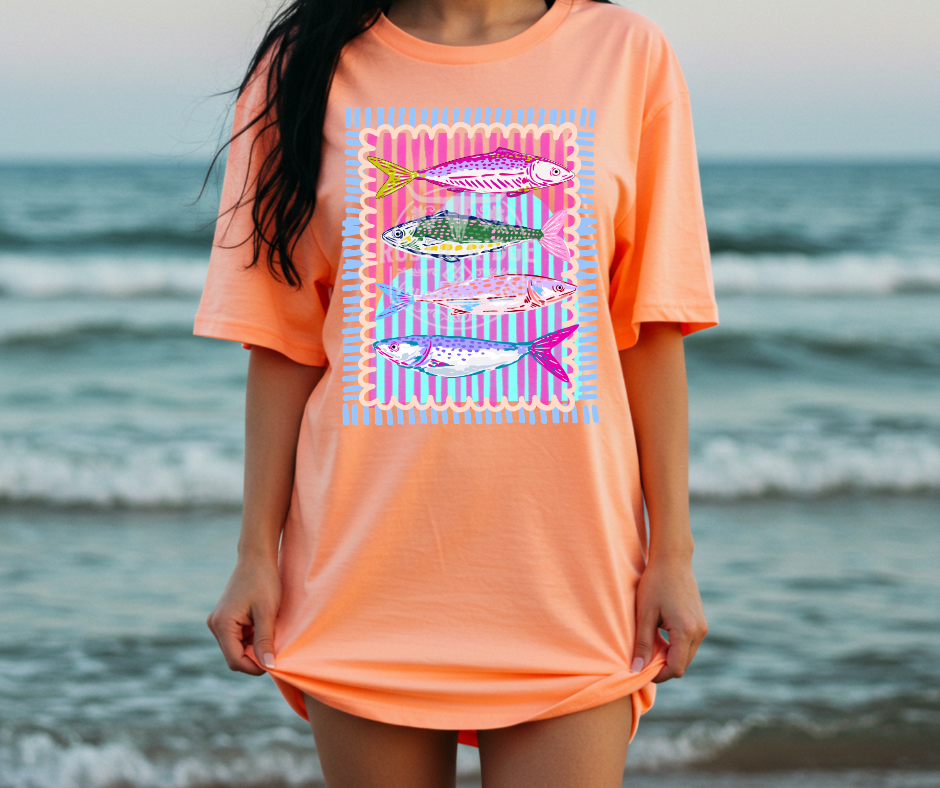 Neon coastal fish graphic on comfort colors neon tee