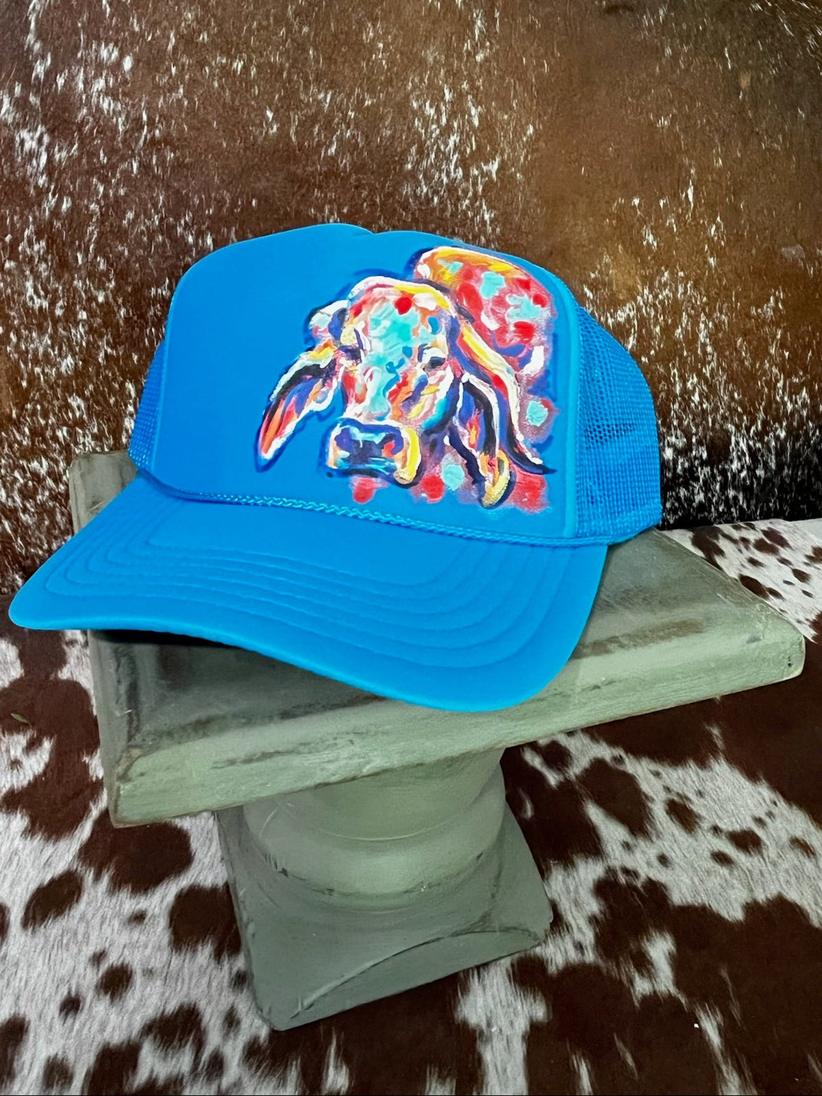 Hand painted western foam hats.