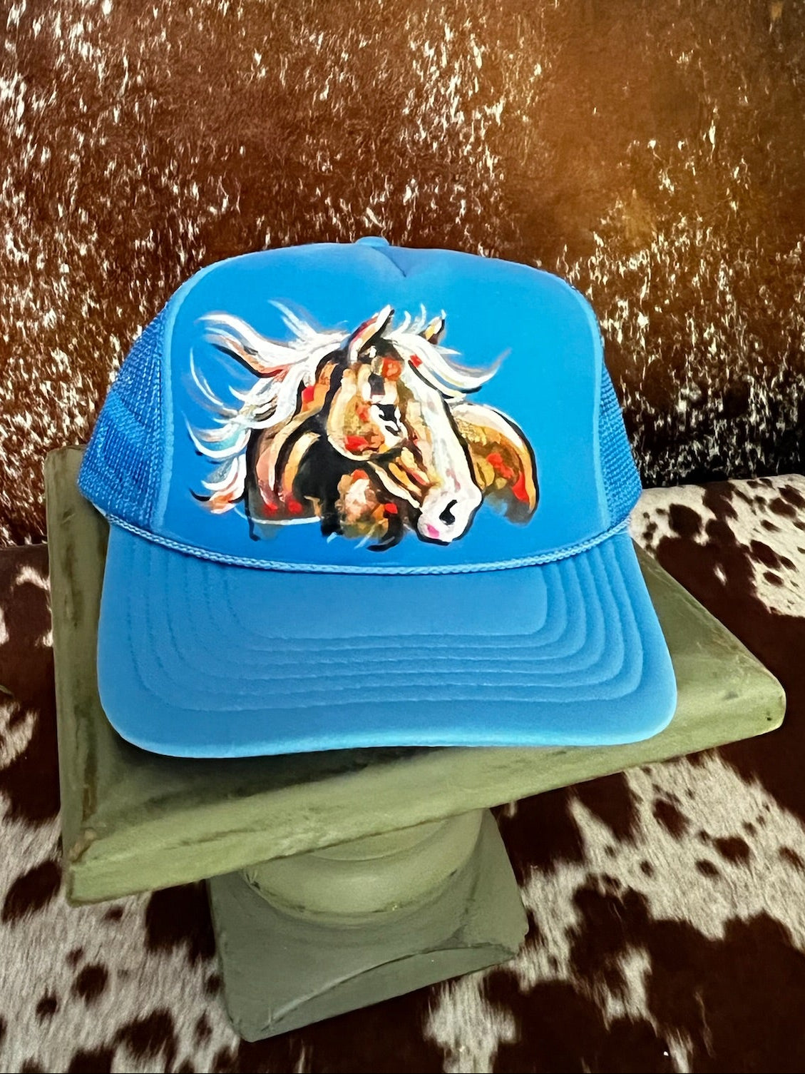 Hand painted western foam hats.