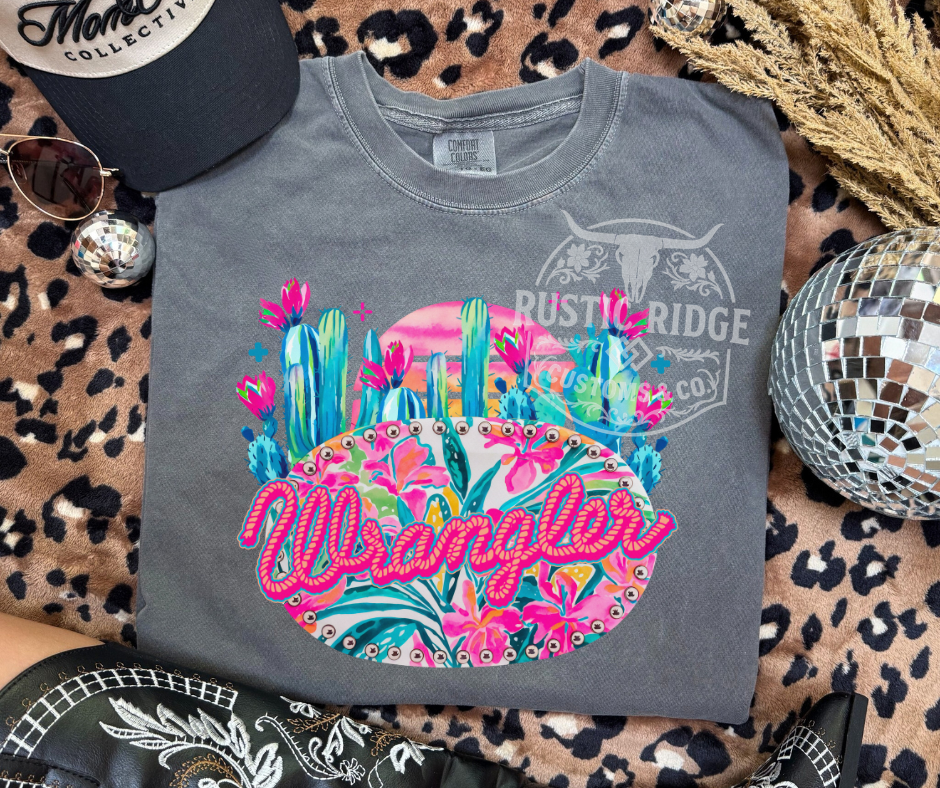 Gray sweatshirt with colorful 'Wrangler' graphic on a pepper surface