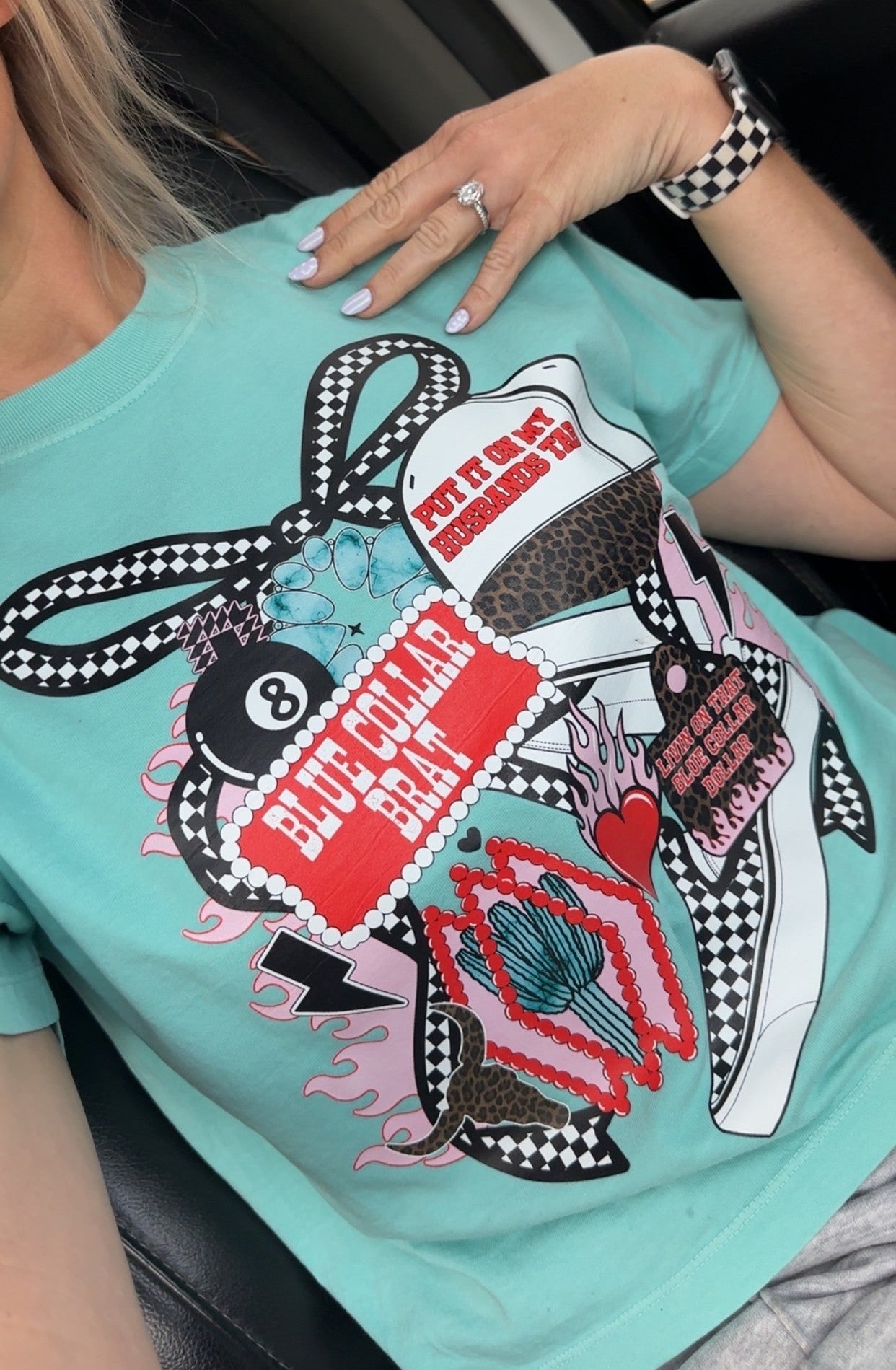 Blue collar brat graphic on comfort colors turquoise tee styled flat lay