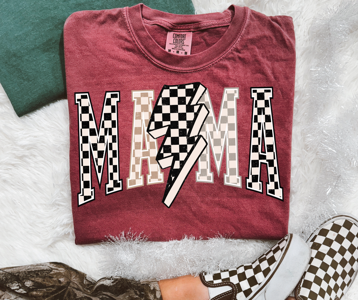 Checkered Lightning Bolt Mama Graphic Tee on a Brick Comfort Colors shirt with black and neutral checkerboard lettering