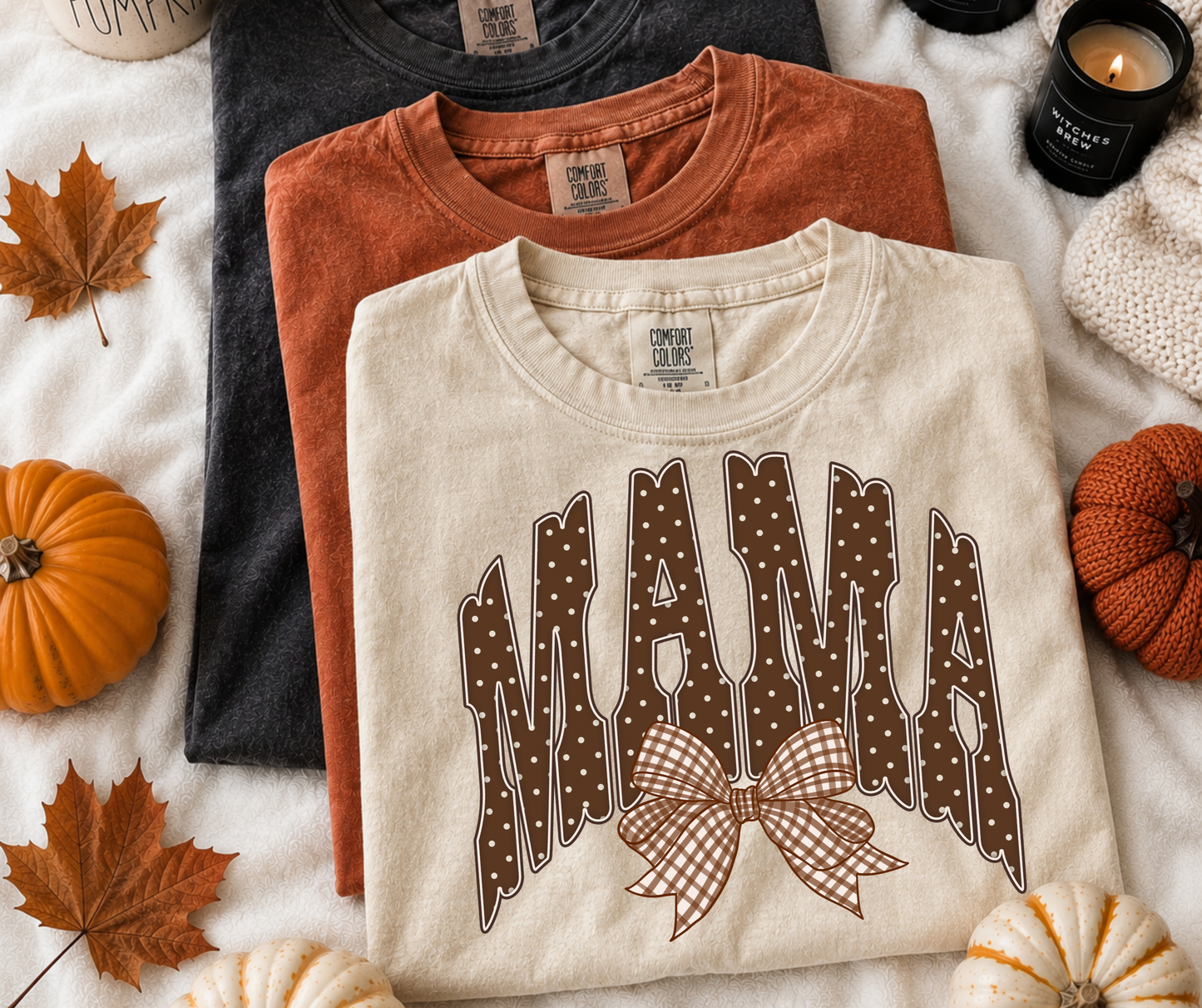 Fall MAMA Bow Graphic Tee on an Ivory Comfort Colors shirt featuring brown polka-dot MAMA lettering and a neutral gingham bow.