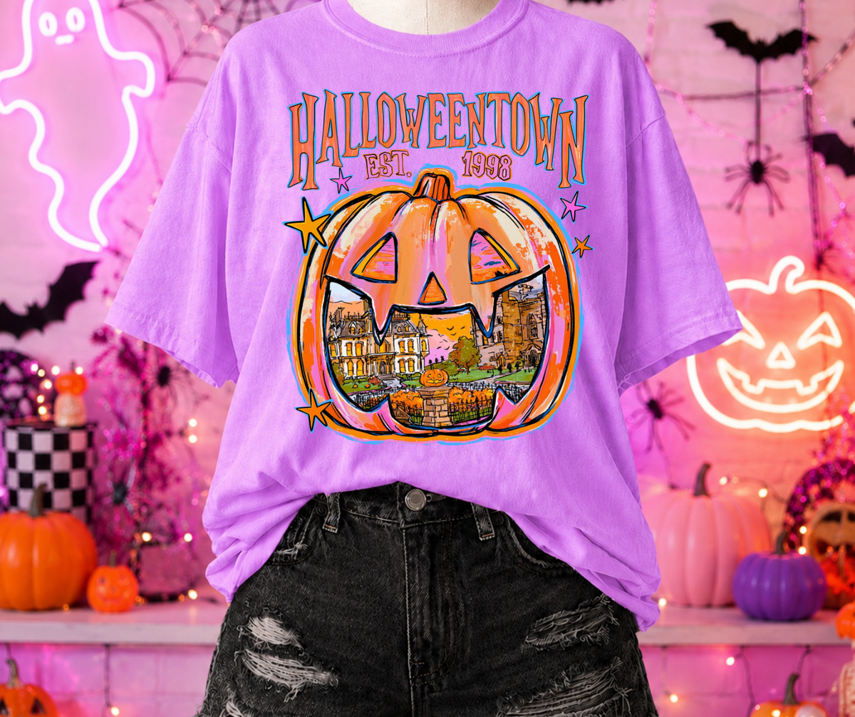 Halloweentown graphic tee in Neon Violet Comfort Colors with colorful jack-o-lantern design