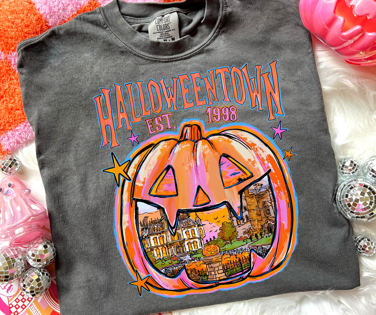 Halloweentown graphic tee in Pepper Comfort Colors with colorful jack-o-lantern design