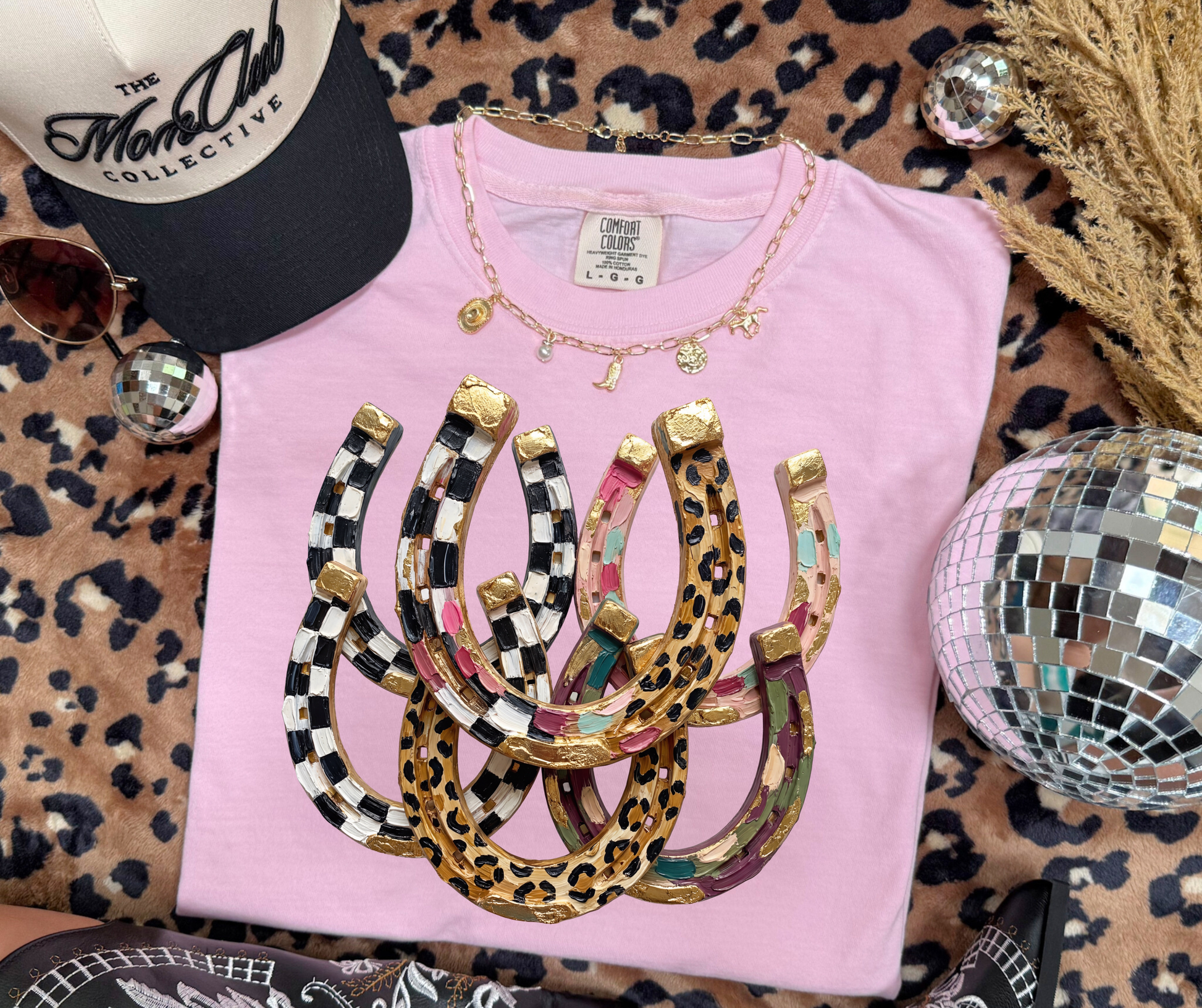 Lucky Charm Horseshoes Graphic Tee in blossom pink with colorful leopard and checkerboard western horseshoes