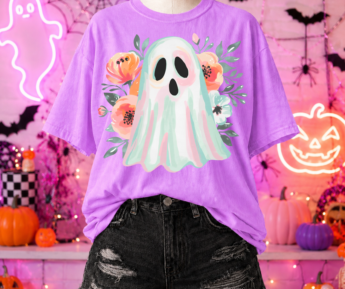 Painted Floral Ghost Graphic Tee on a Neon Violet Comfort Colors shirt featuring a pastel ghost surrounded by colorful painted florals