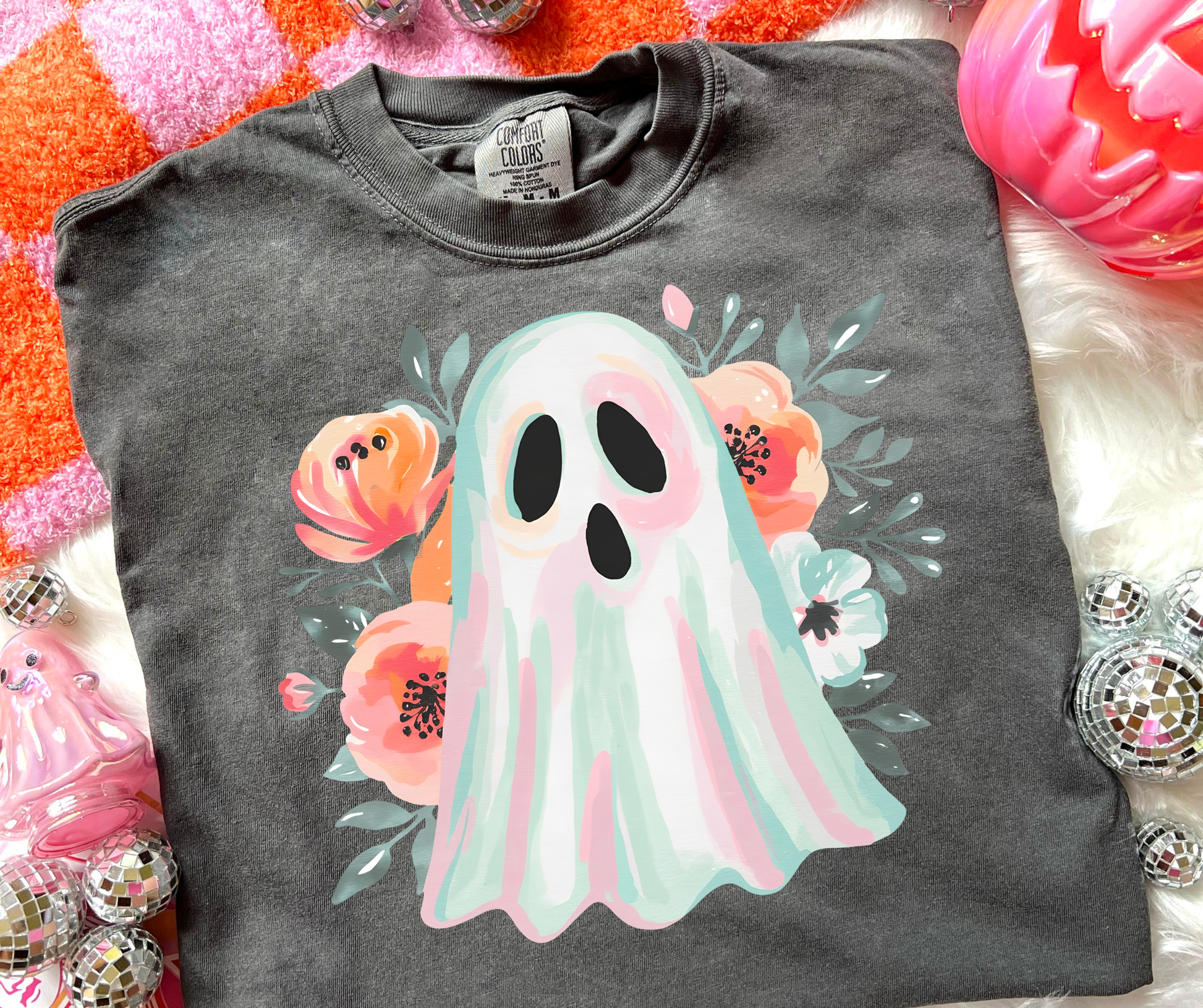Painted Floral Ghost Graphic Tee on a Pepper Comfort Colors shirt with a pastel watercolor ghost and colorful floral design