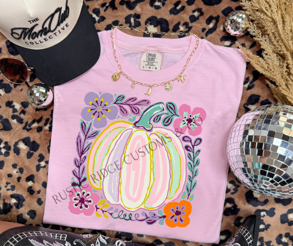 Pastel Pumpkin graphic tee in Blossom Comfort Colors with colorful floral pumpkin design