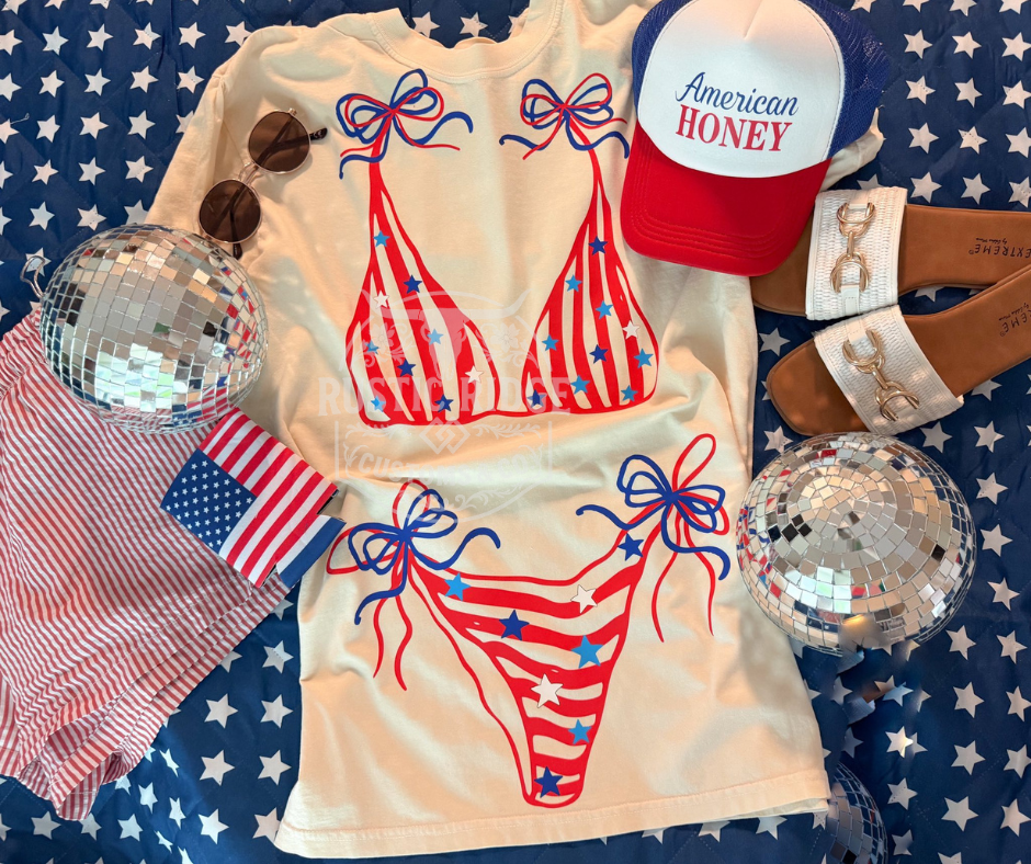 Patriotic bikini graphic tee with red white and blue summer design on Comfort Colors shirt by Rustic Ridge Customs & Co