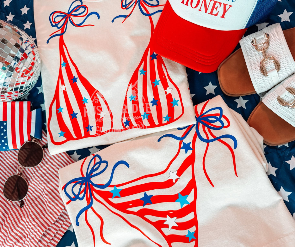 Patriotic bikini graphic tee with red white and blue summer design on Comfort Colors shirt by Rustic Ridge Customs & Co