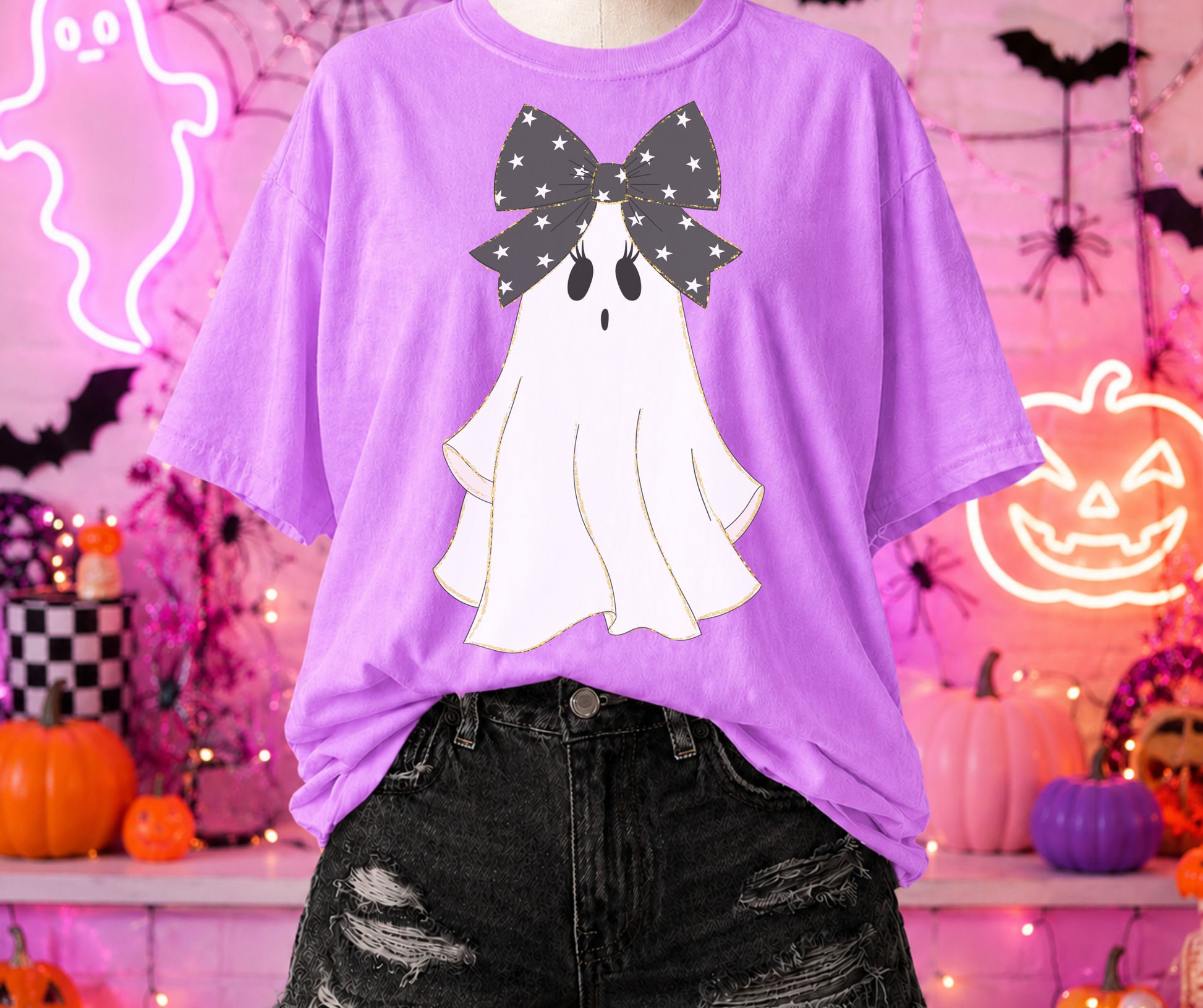 Preppy Bow Ghost Graphic Tee on Neon Violet Comfort Colors featuring a girly white ghost with an oversized star-print bow